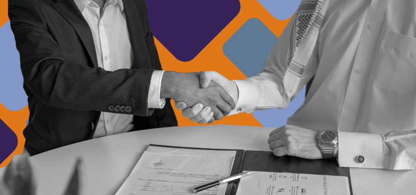 The owner of a home health or hospice agency shakes hands with a consultant after signing up for the Administrative compliance program.